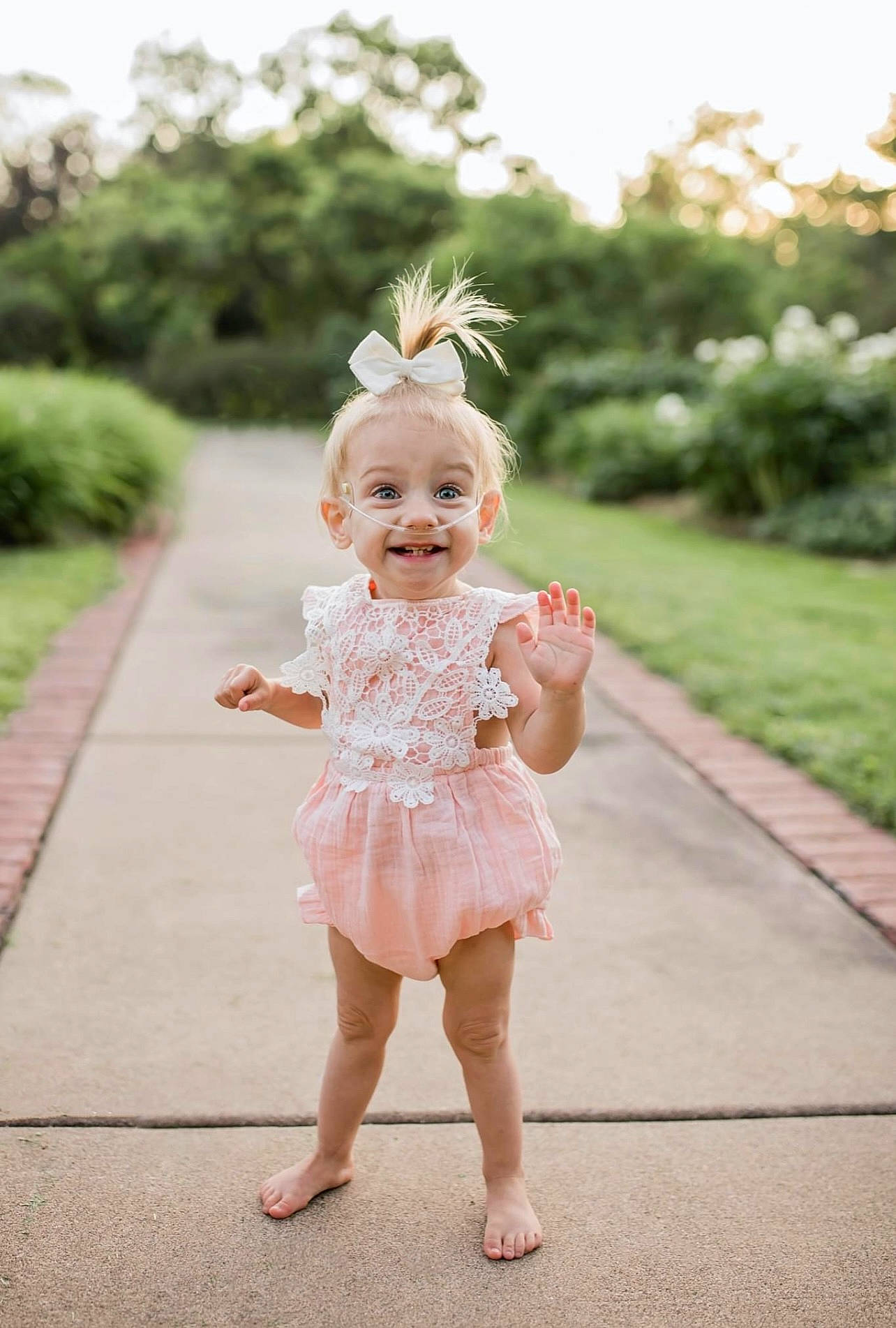 Sawyer joined the competition — help win amazing prizes! baby, baby_toddler_clothing, barefoot, day_dress, dress, face, fun, gesture, grass, hand, happy, head, joy, people_in_nature, person, pink, plant, skin, smile, summer