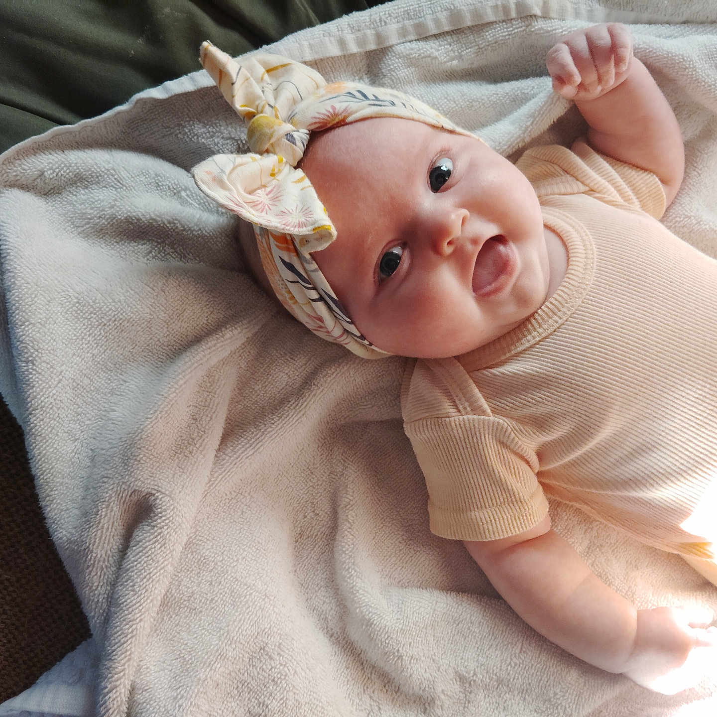 Lainey Paige joined the competition — help win amazing prizes! baby, blanket, bodypart, bonnet, cap, clothing, face, finger, hand, happy, hat, head, hood, newborn, person, photography, portrait, smile, towel