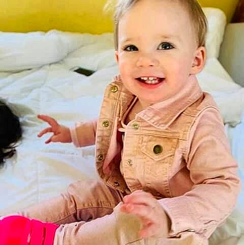 Makayla is registered to the contest to win money with this photo: cheek, child, finger, infant, joy, person, play, product, sitting, skin, toddler