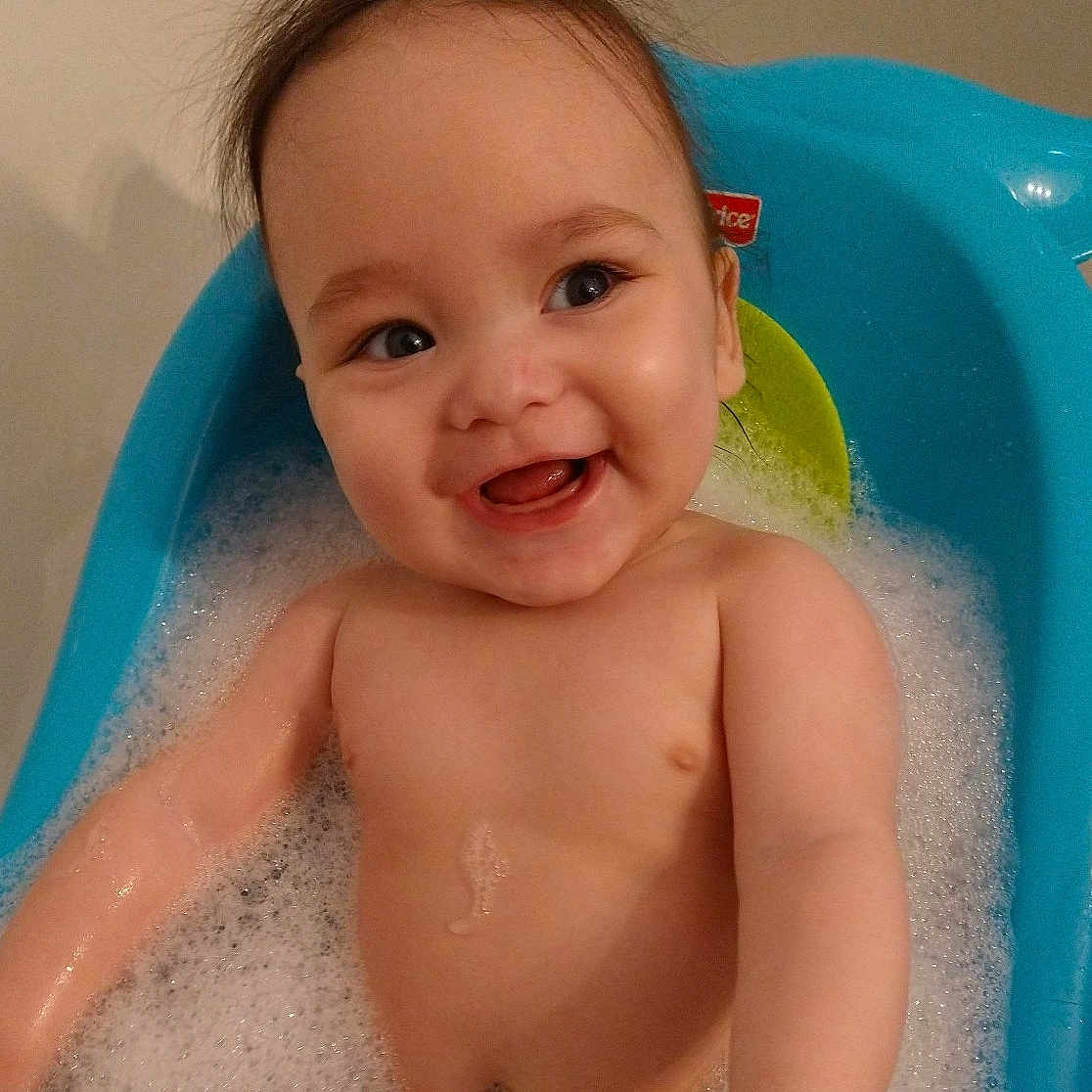 Tyson is registered to the contest to win money with this photo: baby, babylaughing, bathing, bathtub, bubble, face, happy, head, indoors, laughing, leisureactivities, person, photography, portrait, smile, sport, swimming, tub, water, watersports
