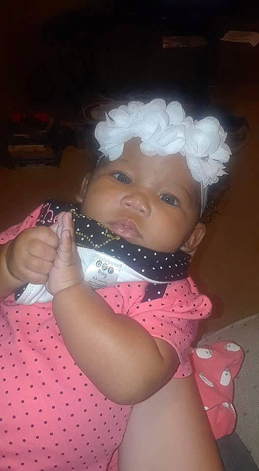 Kaiya is registered to the contest to win money with this photo: baby, cheek, child, hair_accessory, headgear, headpiece, headwear, person, pink, skin, toddler