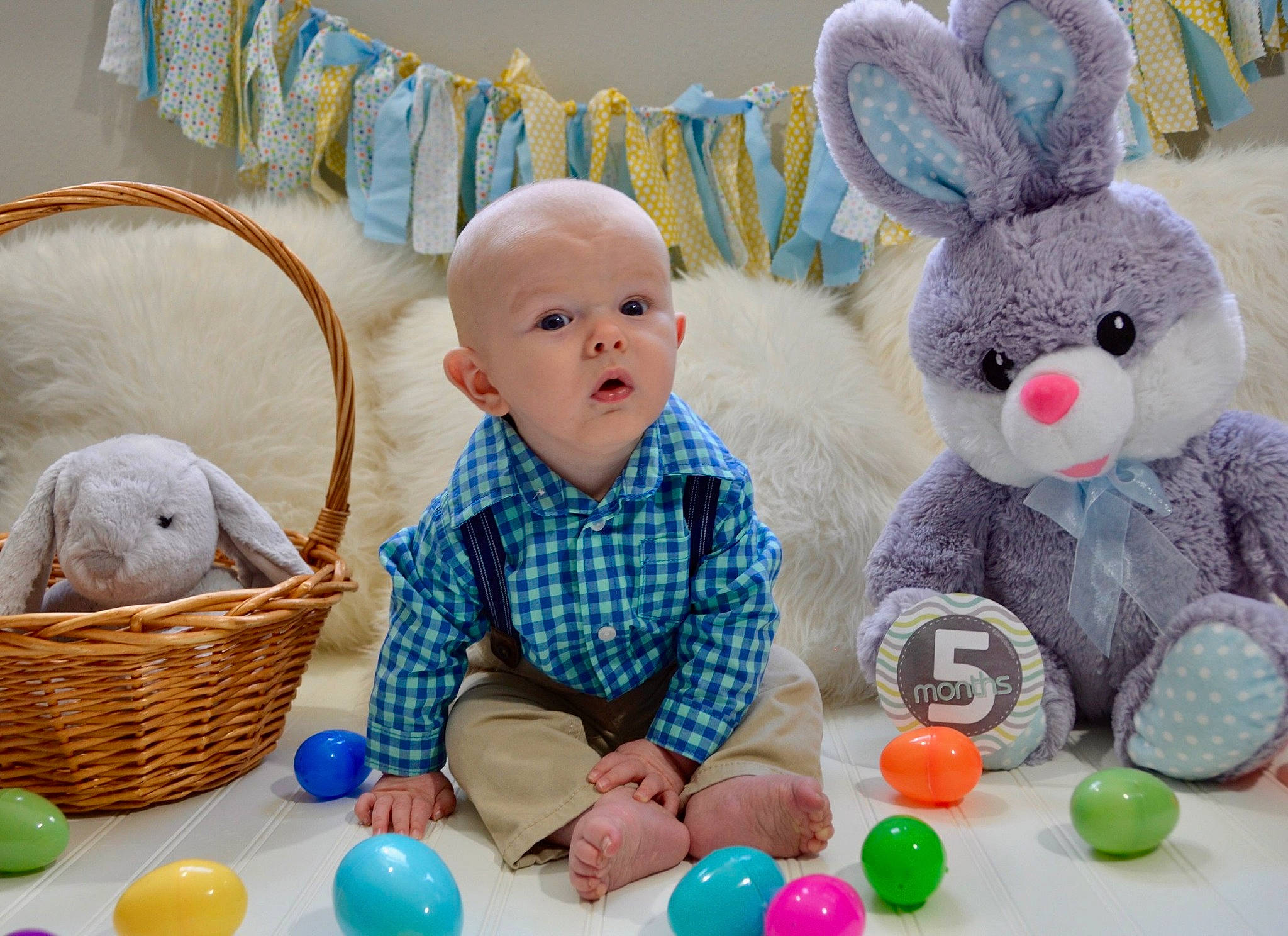 Deklan is registered to the contest to win money with this photo: child, ear, easter, easter_bunny, easter_egg, event, food, holiday, person, play, plush, room, stuffed_toy, surprise, toddler
