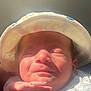 baby, infant, hat, sleeping, hand, face, skin, clothing, sunlight, closeup, portrait, newborn, peaceful, soft, cute, child, resting, indoors, headwear, expression