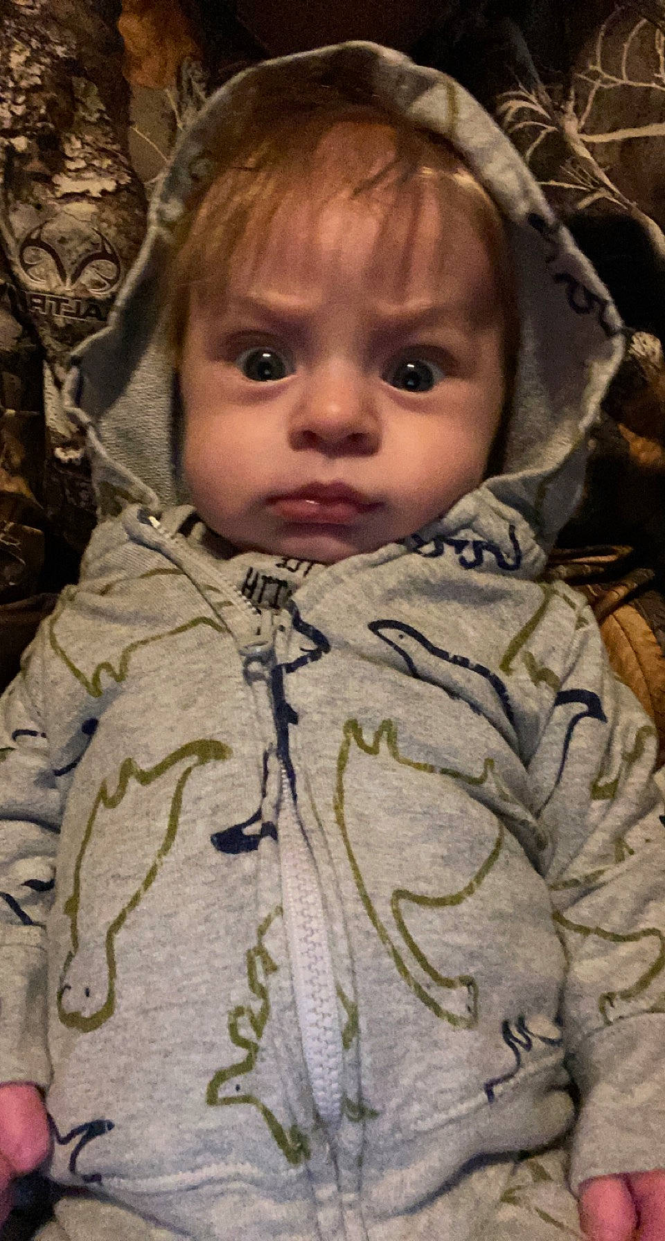 Dakota is registered to the contest to win money with this photo: baby, baby_toddler_clothing, beauty, cheek, eye, eyebrow, eyelash, face, forehead, headgear, iris, lip, military_camouflage, nose, organ, outerwear, person, photograph, skin, sleeve