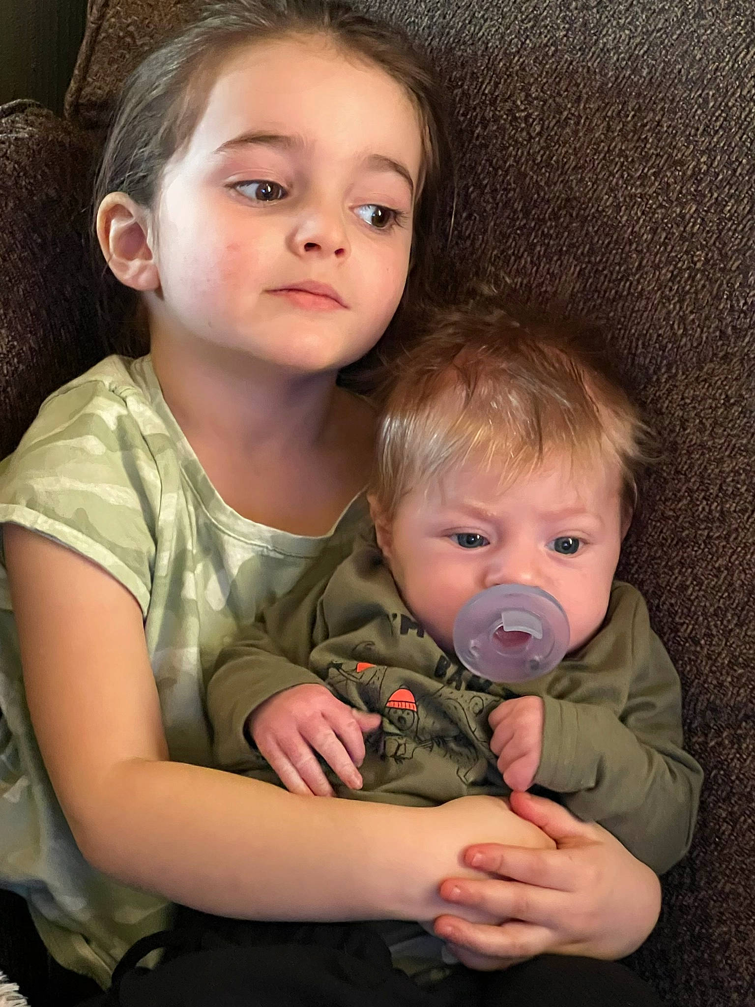 Dakota is registered to the contest to win money with this photo: arm, baby, baby_toddler_clothing, cheek, chin, eye, facial_expression, fun, gesture, hairstyle, hand, happy, head, human_body, iris, lip, nose, person, skin, standing