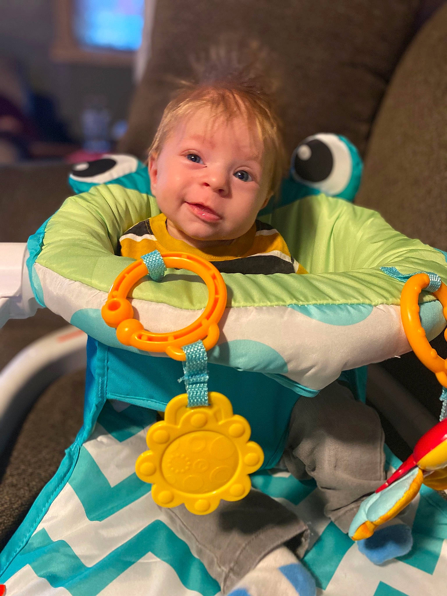 Dakota is registered to the contest to win money with this photo: baby, baby_carriage, baby_mobile, baby_products, baby_safety, baby_toddler_clothing, chair, child, comfort, fun, happy, head, leisure, orange, people, person, sitting, skin, stuffed_toy, toddler