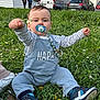 Elliot a rejoint le concours — aidez-le/la à gagner de superbes lots ! architecture, baby, building, clothing, face, footwear, grass, head, nature, neighborhood, outdoors, pants, park, person, photography, plant, portrait, shelter, shoe, soil