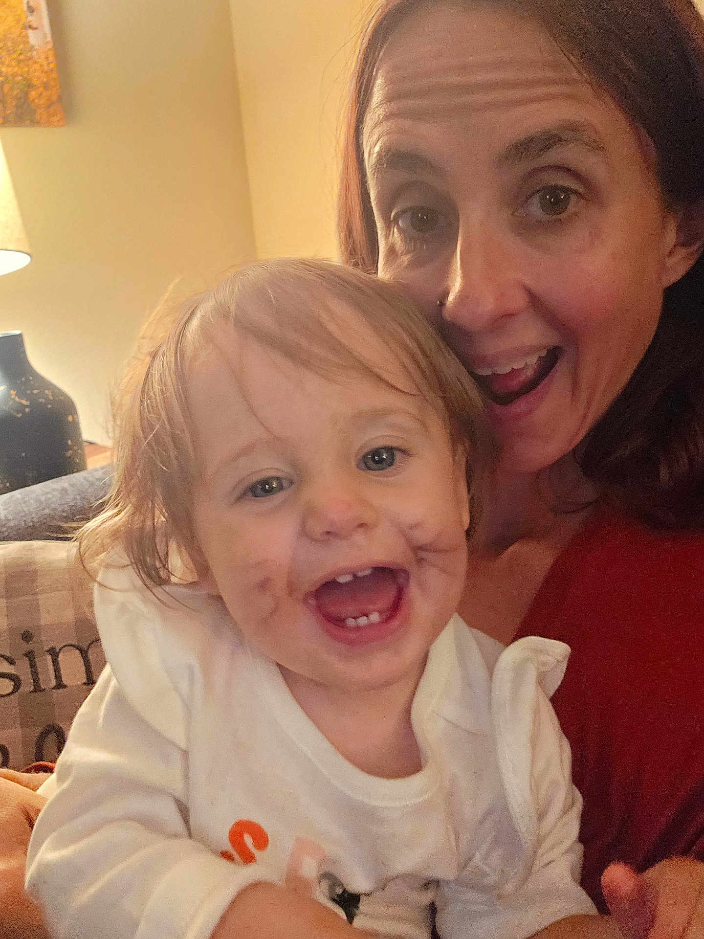 Adeline joined the competition — help win amazing prizes! toddler, child, woman, smiling, happy, face_paint, indoor, living_room, person, family, candid, joy, expression, hair, clothing, holding, closeup, parent, cheerful, home