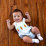 baby, child, infant, smiling, wooden_floor, romper, carrot_design, white_socks, playful, happy, cute, indoor, person, skin, head, arms, legs, clothing, flooring, portrait