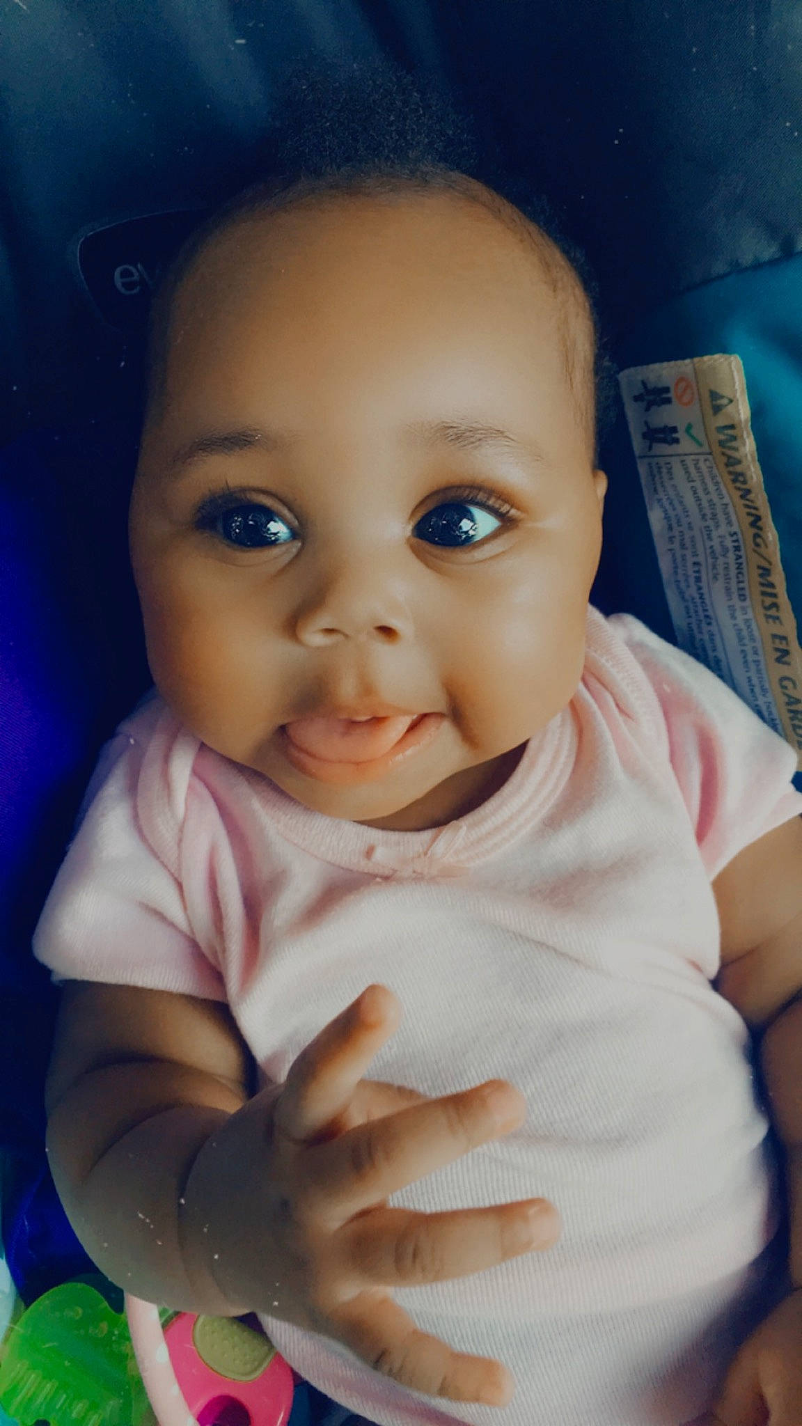 Heaven is registered to the contest to win money with this photo: baby, baby_toddler_clothing, cheek, chin, close_up, eye, eyebrow, eyelash, finger, flash_photography, gesture, happy, iris, lip, mouth, nose, person, skin, sleeve, thumb