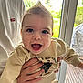 élio a rejoint le concours — aidez-le/la à gagner de superbes lots ! accessories, baby, babylaughing, blonde, clothing, face, hair, happy, head, jewelry, knitwear, laughing, pants, person, photography, portrait, shirt, smile, sweater, t_shirt