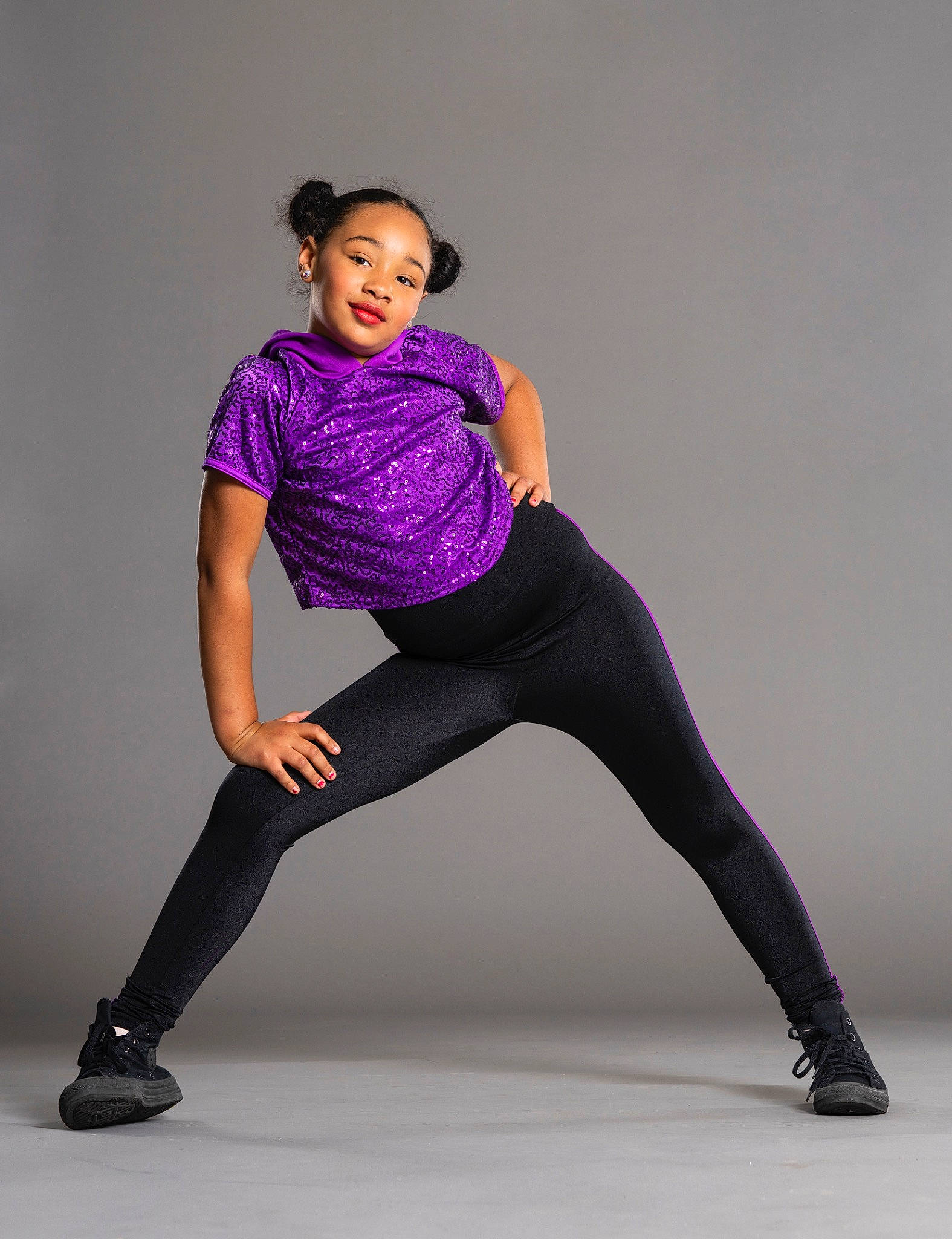Amaya is registered to the contest to win money with this photo: abdomen, active_pants, arm, fashion_design, flash_photography, foot, human_body, knee, leg, neck, performing_arts, person, purple, shoulder, sleeve, sportswear, thigh, trousers, trunk, waist