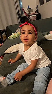 Jayla joined the competition — help win amazing prizes! baby, baby_toddler_clothing, child, comfort, event, flooring, fun, happy, holiday, lap, leg, person, room, shorts, sitting, smile, t_shirt, thigh, thumb, toddler