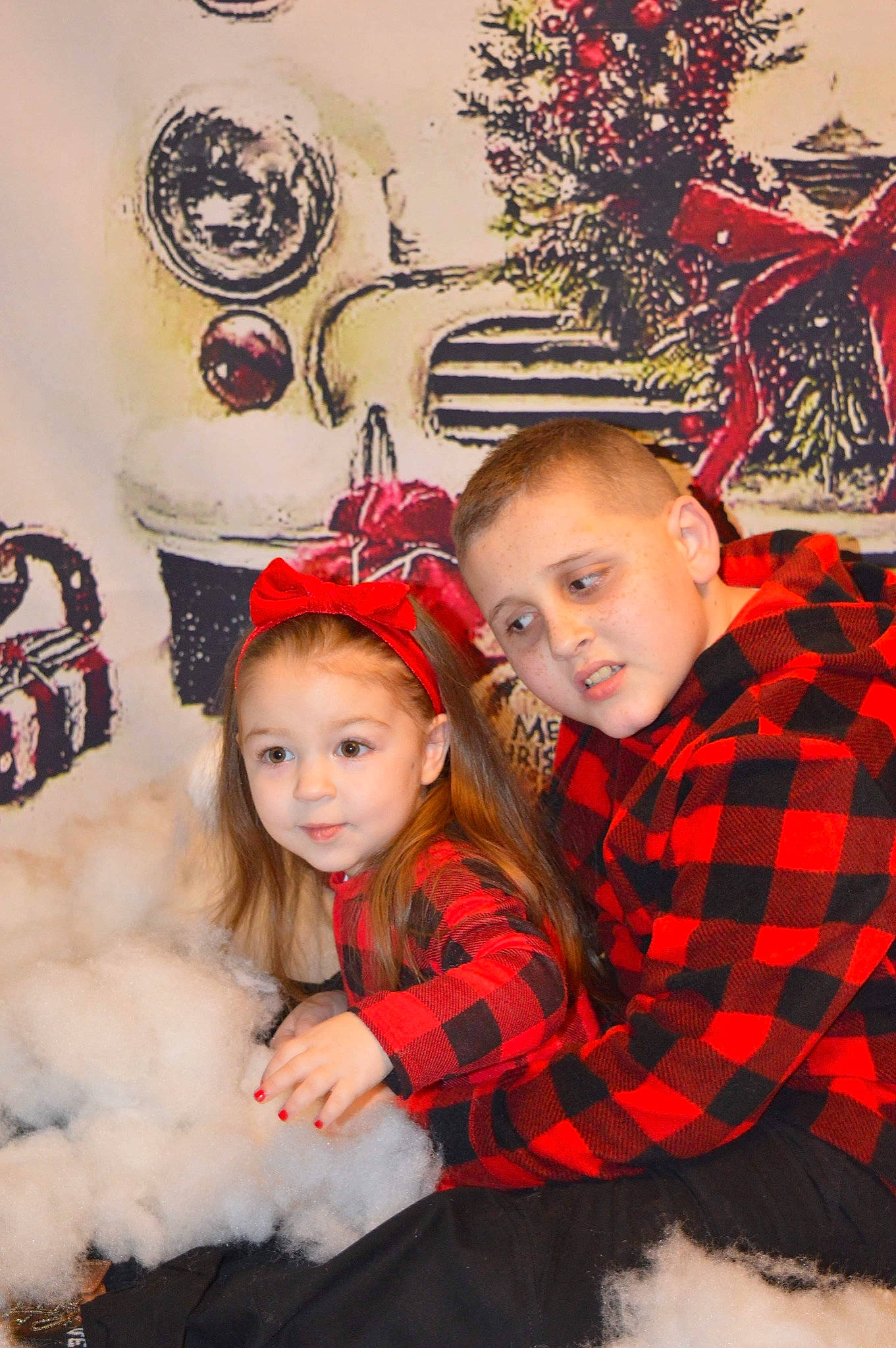 Crystal is registered to the contest to win money with this photo: christmas, christmas_ornament, eye, facial_expression, fashion, hairstyle, happy, head, headgear, mammal, orange, organ, outerwear, person, photograph, red, standing, tartan, textile, toddler