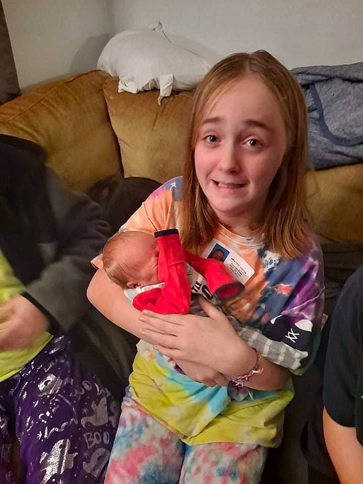 Patricia is registered to the contest to win money with this photo: beauty, child, comfort, couch, event, finger, fun, hairstyle, happy, human_leg, iris, joy, lap, long_hair, nail, person, room, skin, smile, t_shirt