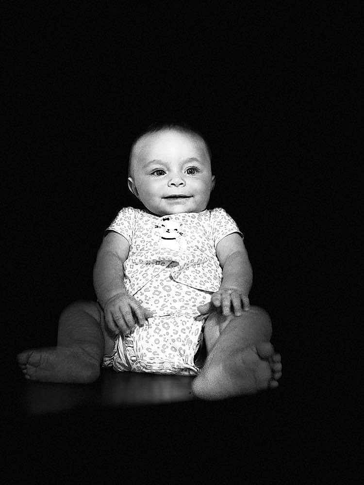 Angel joined the competition — help win amazing prizes! arm, baby, baby_toddler_clothing, cheek, child, comfort, darkness, elbow, flash_photography, fun, gesture, hand, happy, iris, joy, monochrome, monochrome_photography, person, sitting, sleeve