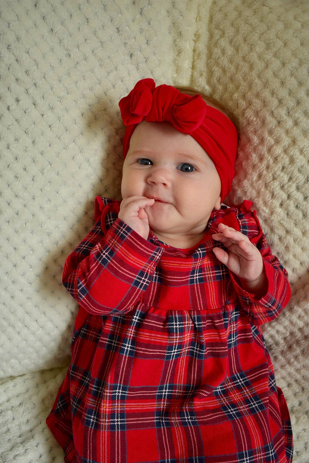 Ivy-rae is registered to the contest to win money with this photo: baby, baby_toddler_clothing, cap, child, clothing, collar, costume_hat, face, happy, headgear, headwear, lip, outerwear, pattern, person, plaid, plant, sleeve, smile, tartan