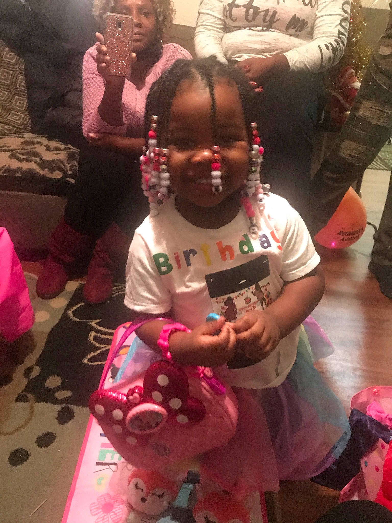 Amariana is registered to the contest to win money with this photo: adaptation, child, event, flooring, fun, happy, joy, leisure, magenta, party, pattern, person, pink, play, recreation, red, room, sitting, skin, t_shirt