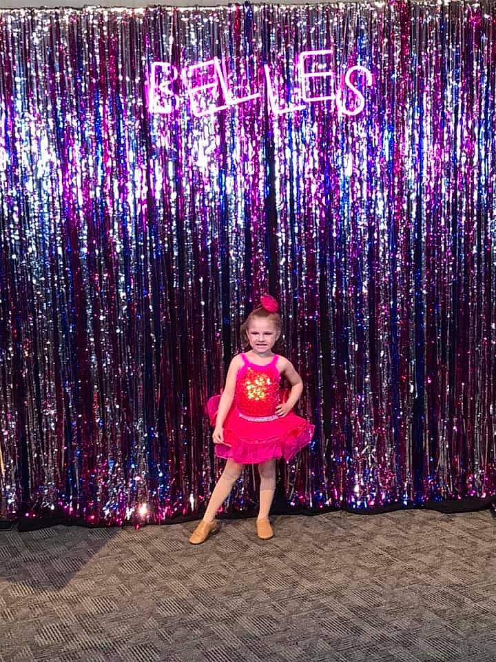 Rachel joined the competition — help win amazing prizes! dress, event, fun, light, lighting, magenta, night, party, party_supply, performance, person, pink, purple, stage, talent_show, tree