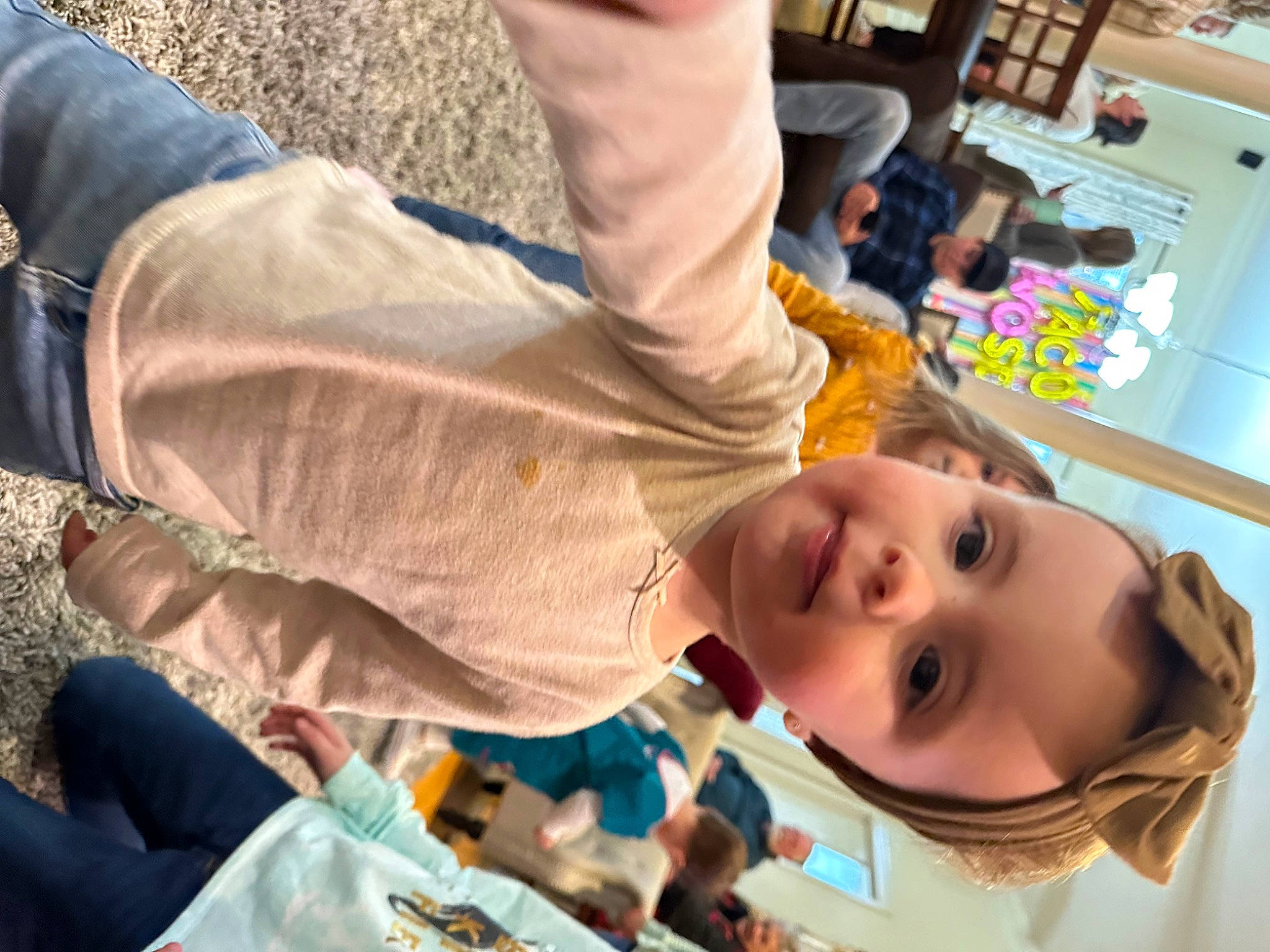 Eleanor is registered to the contest to win money with this photo: baby, blurred, chair, child, event, eyelash, flooring, fun, gesture, happy, human_leg, leisure, mouth, nail, person, photograph, play, room, sitting, summer