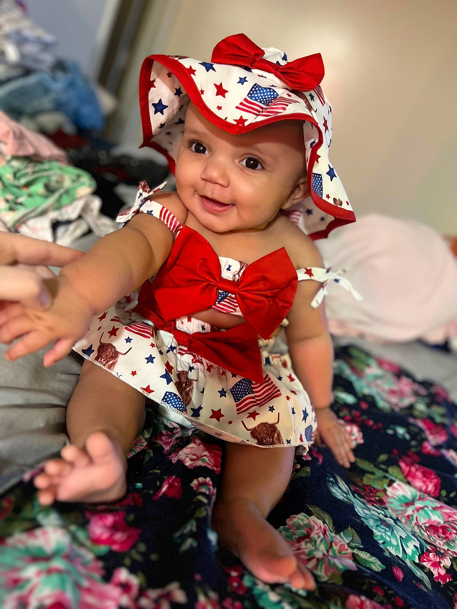 Leilani is registered to the contest to win money with this photo: baby_toddler_clothing, cap, child, costume_hat, dress, event, face, fun, happy, hat, headgear, headwear, human_leg, magenta, pattern, person, pink, skin, smile, textile