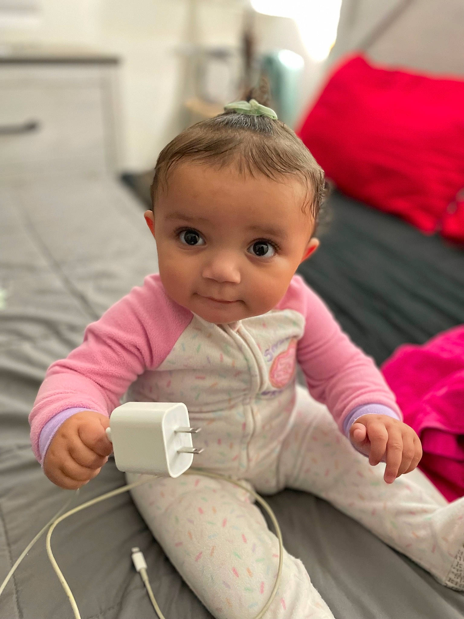 Leilani is registered to the contest to win money with this photo: arm, baby, baby_toddler_clothing, cheek, child, comfort, eye, finger, floor, flooring, fun, happy, leisure, person, play, room, sitting, skin, smile, toddler