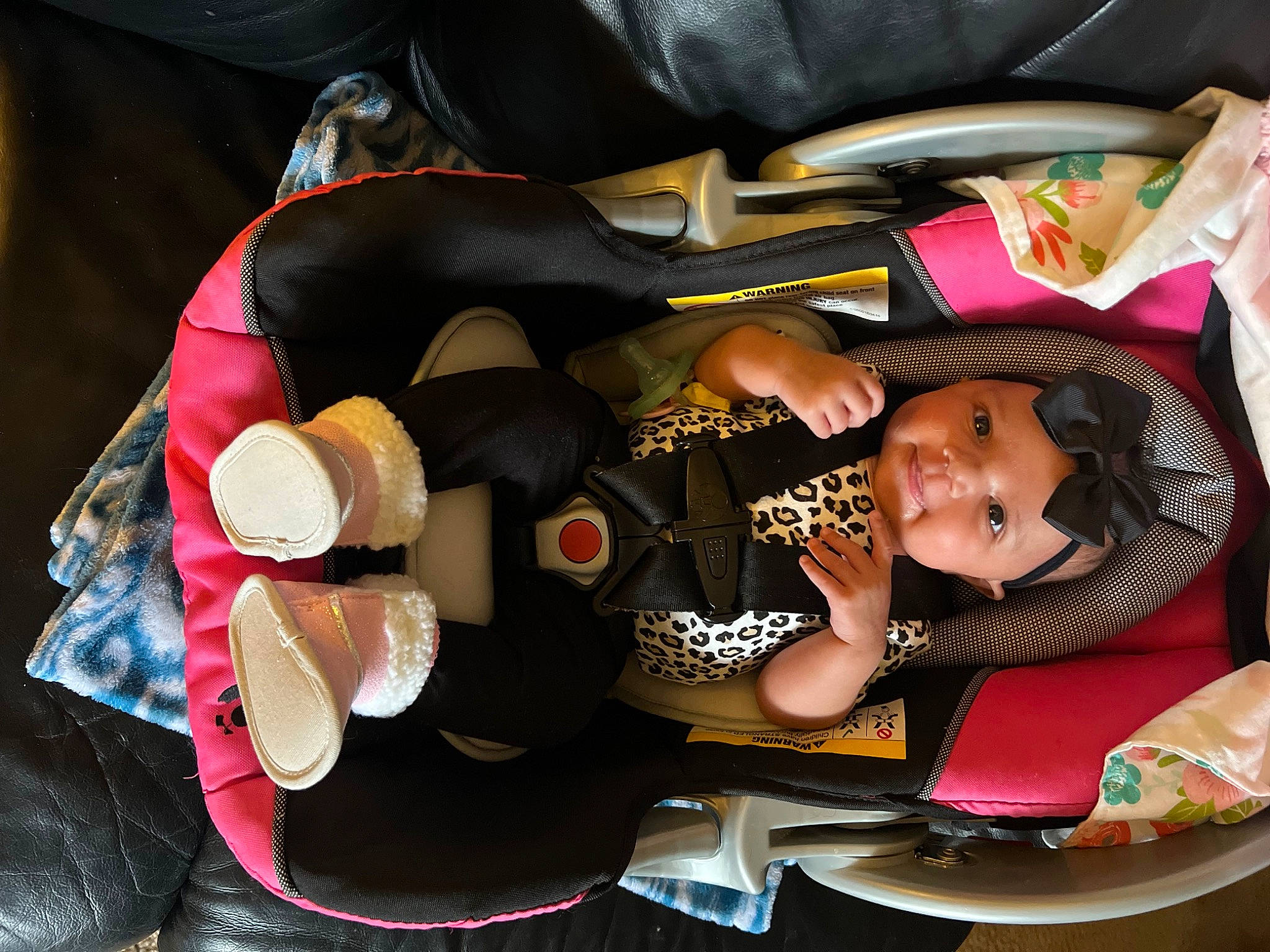 Leilani is registered to the contest to win money with this photo: auto_part, automotive_design, baby_products, car_seat, carmine, child, comfort, fun, headwear, luxury_vehicle, nail, person, room, smile, t_shirt, thigh, toddler, trunk, vehicle