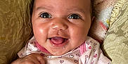 Kyomi joined the competition — help win amazing prizes! baby, smiling, infant, heart_pattern, onesie, blanket, cushion, happy, face, child, cute, indoors, portrait, young_child, skin, person, cozy, expression, head, closeup