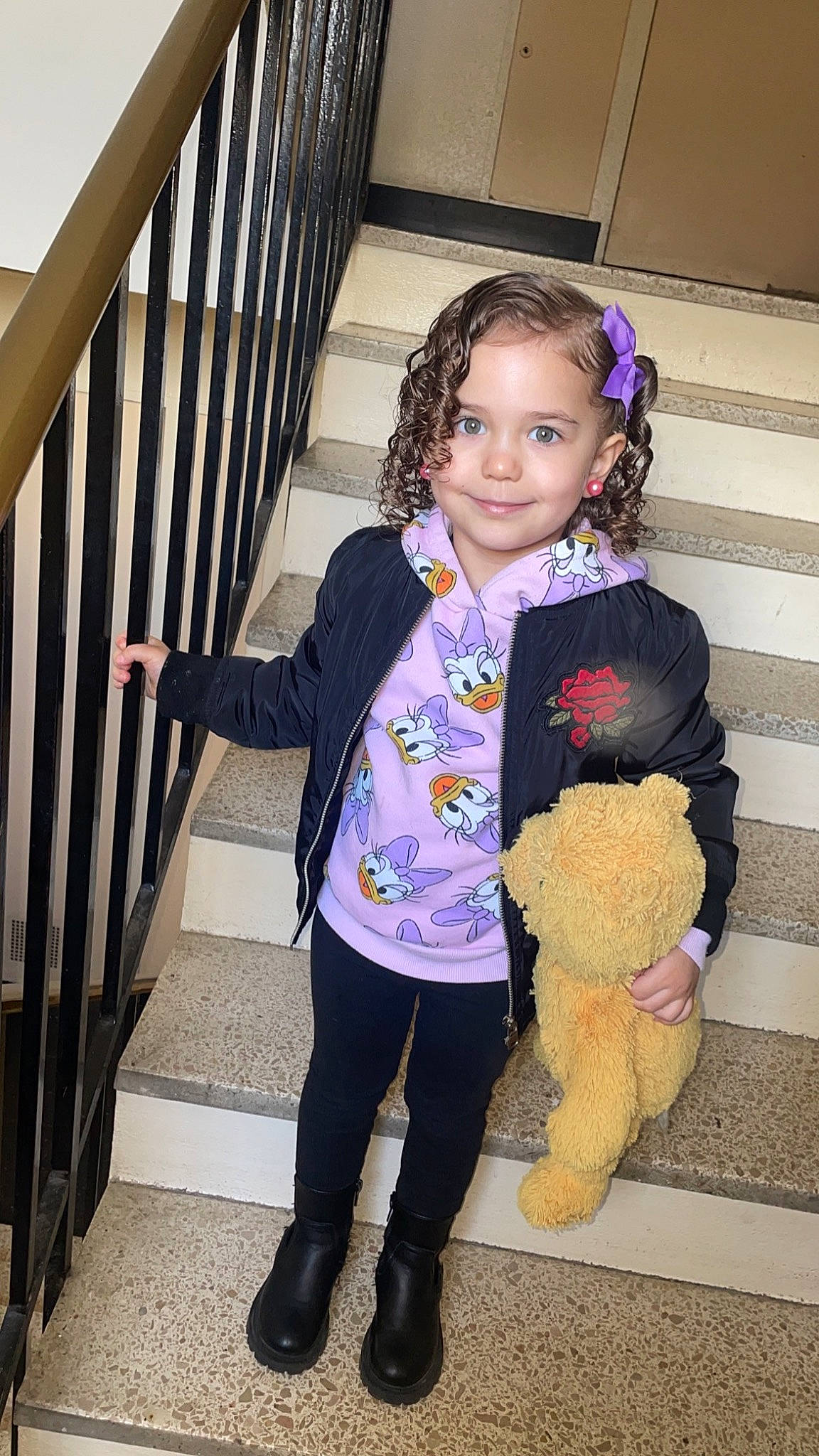 Maria participe au concours pour gagner de l'argent avec cette photo : baby_toddler_clothing, child, design, fun, hair, happy, head, joy, magenta, outerwear, person, purple, shoe, skin, sleeve, smile, stairs, standing, stuffed_toy, textile