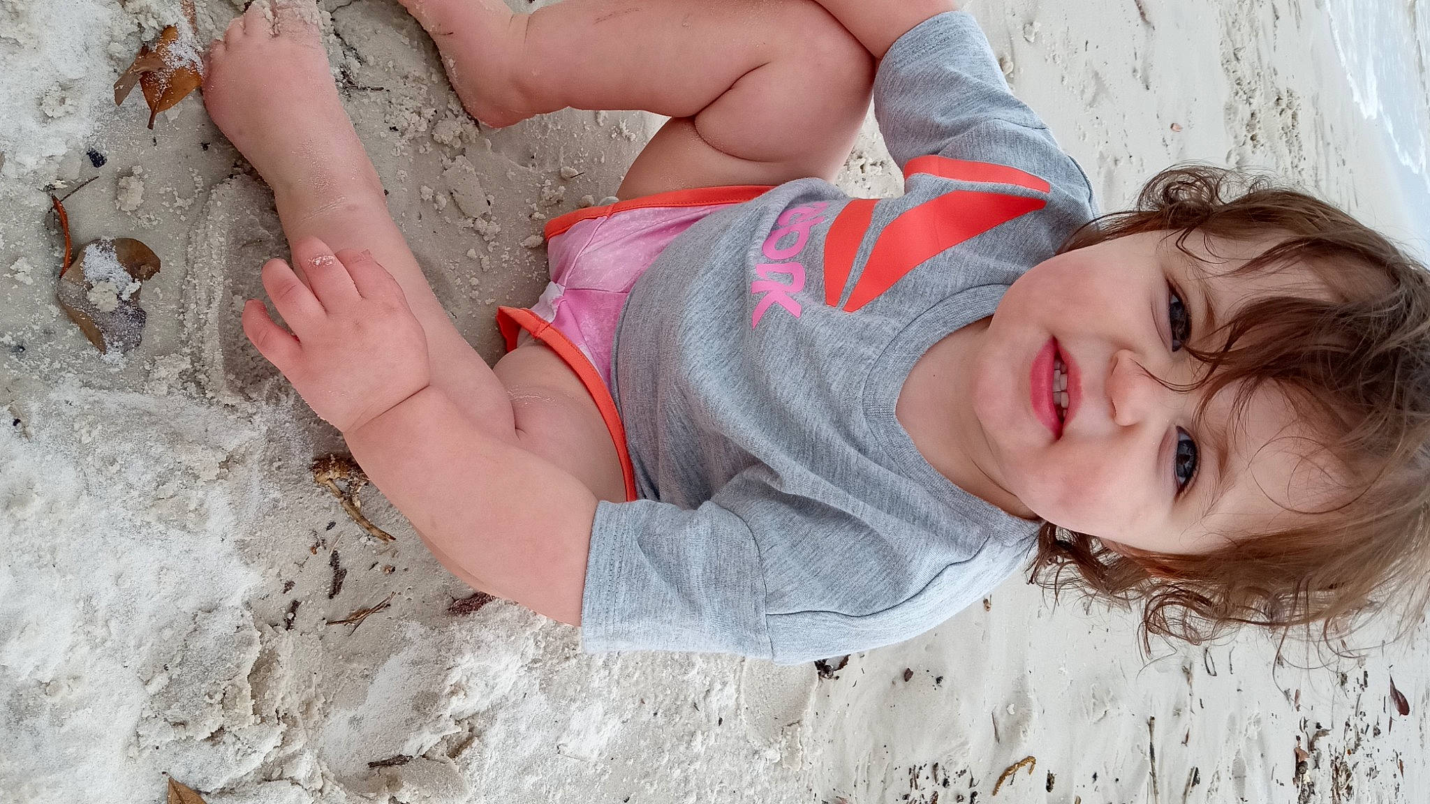 Chevelle joined the competition — help win amazing prizes! arm, elbow, fun, grass, hand, happy, human_body, human_leg, leg, leisure, people_in_nature, person, pink, plant, sand, skin, smile, summer, thigh, toddler