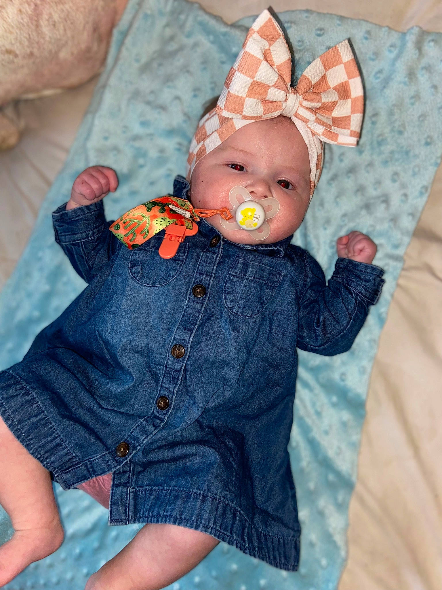 Lilliana joined the competition — help win amazing prizes! azure, baby_toddler_clothing, child, costume_hat, doll, dress, dress_shirt, fashion_accessory, fawn, headwear, human_body, linens, orange, pattern, peach, person, pink, skin, sleeve, textile