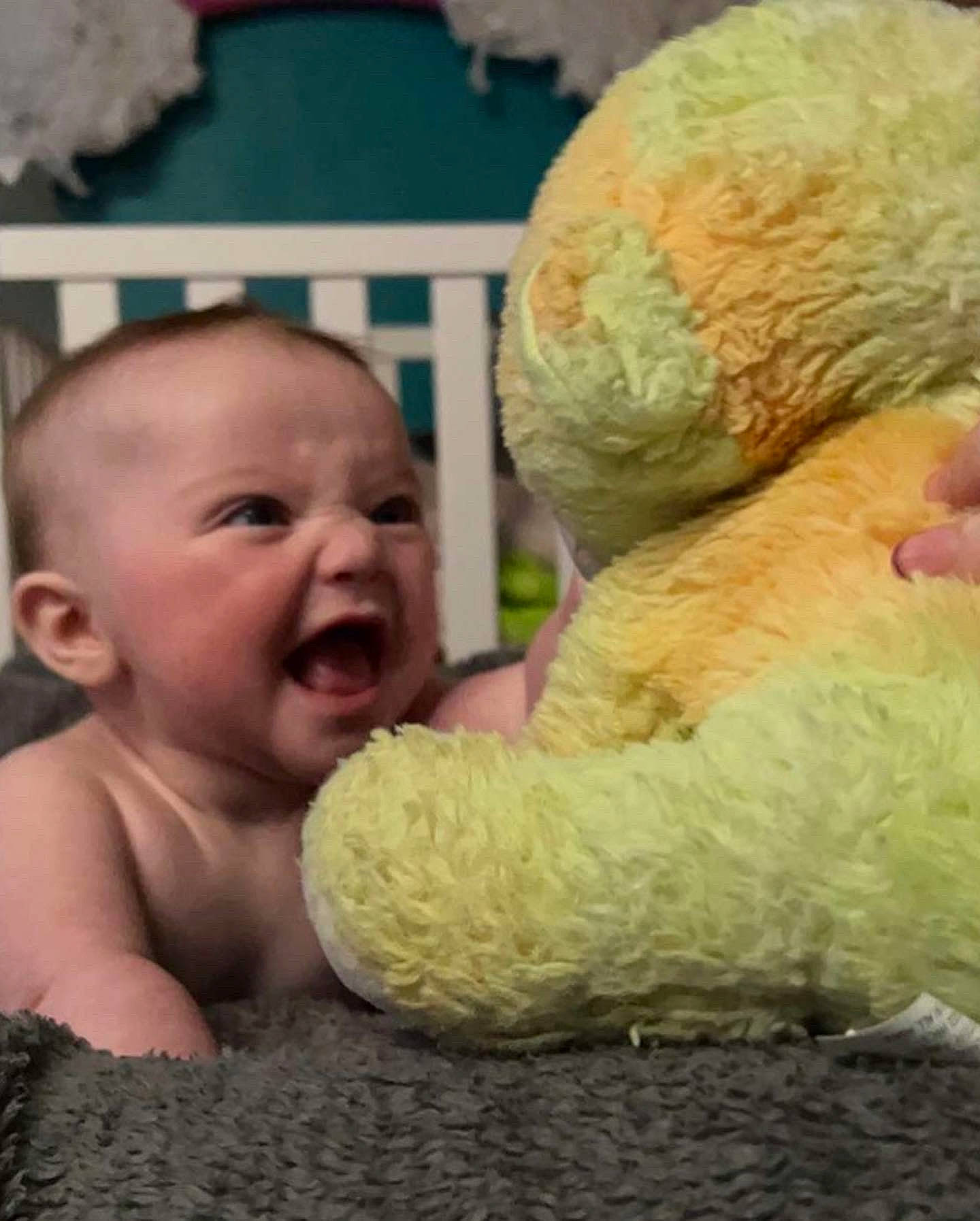 Novah is registered to the contest to win money with this photo: baby, baby_toddler_clothing, cheek, child, comfort, finger, fun, fur, happy, nose, organ, person, plush, sitting, skin, smile, stuffed_toy, toddler, toy, vertebrate
