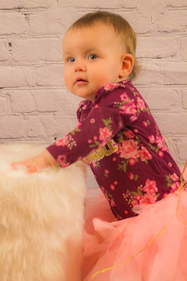 Aspen joined the competition — help win amazing prizes! arm, baby_toddler_clothing, clothing, dress, facial_expression, finger, hair, happy, human_body, joint, lip, neck, nose, outerwear, person, pink, shoulder, skin, sleeve, standing
