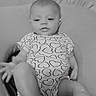 Kinsley joined the competition — help win amazing prizes! baby, child, infant, portrait, sitting, onesie, hearts, clothing, face, eyes, monochrome, black_and_white, sparkles, filter, chair, indoor, candid, cute, legs, photography