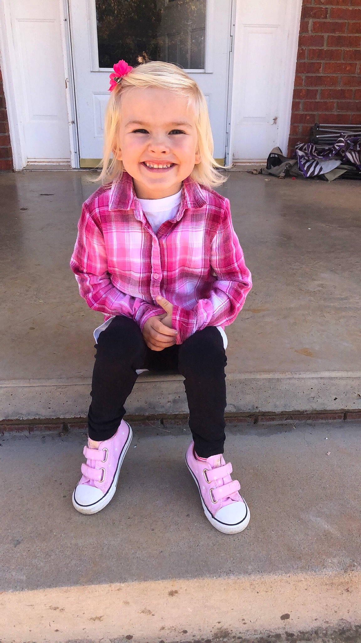 Rayleigh is registered to the contest to win money with this photo: child, child_model, design, fashion_accessory, footwear, happy, joy, outerwear, pattern, person, pink, plaid, play, shoe, smile, toddler