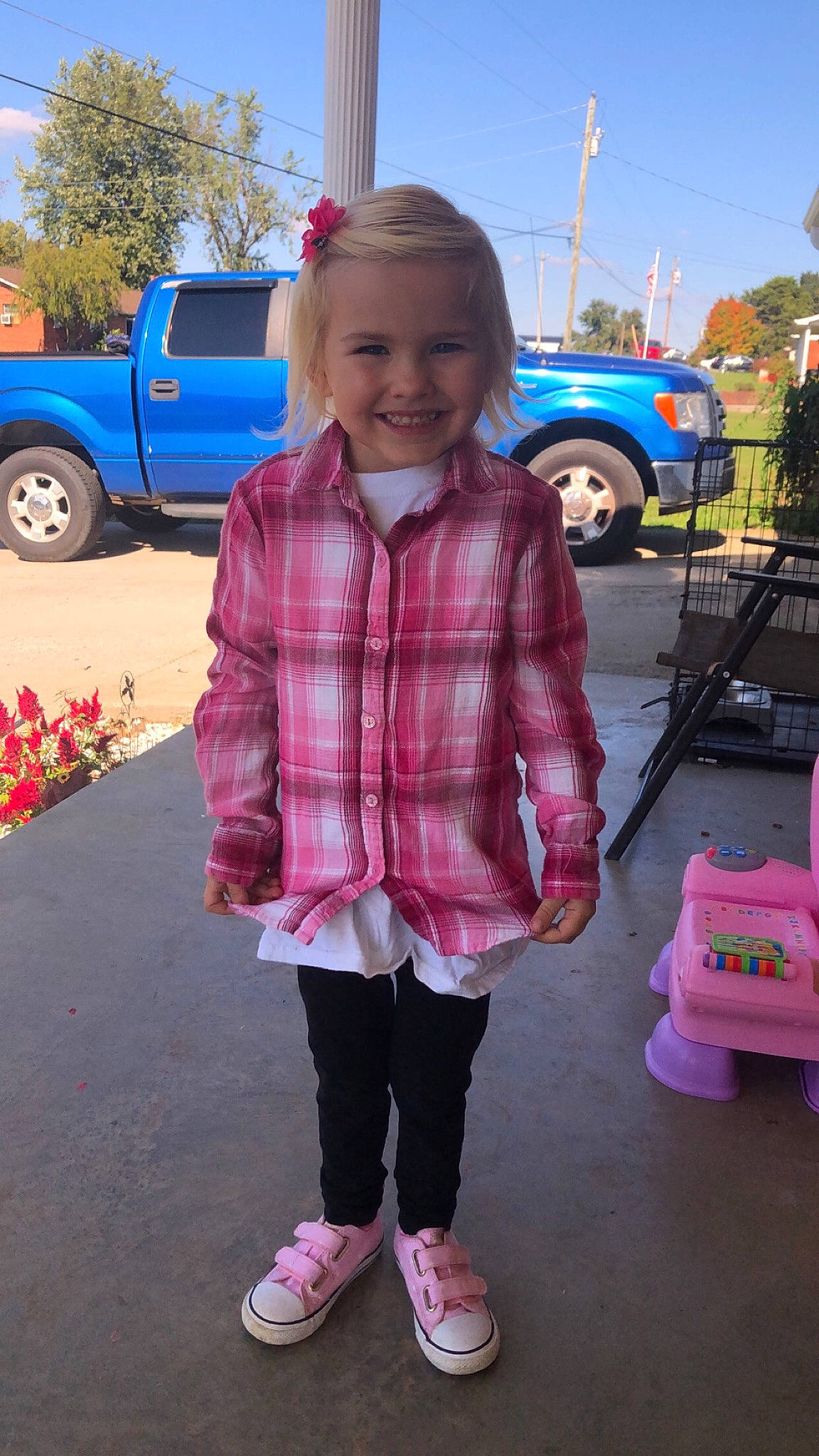 Rayleigh is registered to the contest to win money with this photo: car, child, city_car, family_car, fun, joy, luxury_vehicle, magenta, outerwear, pattern, person, pickup_truck, pink, plaid, sport_utility_vehicle, tartan, toddler, vacation, vehicle