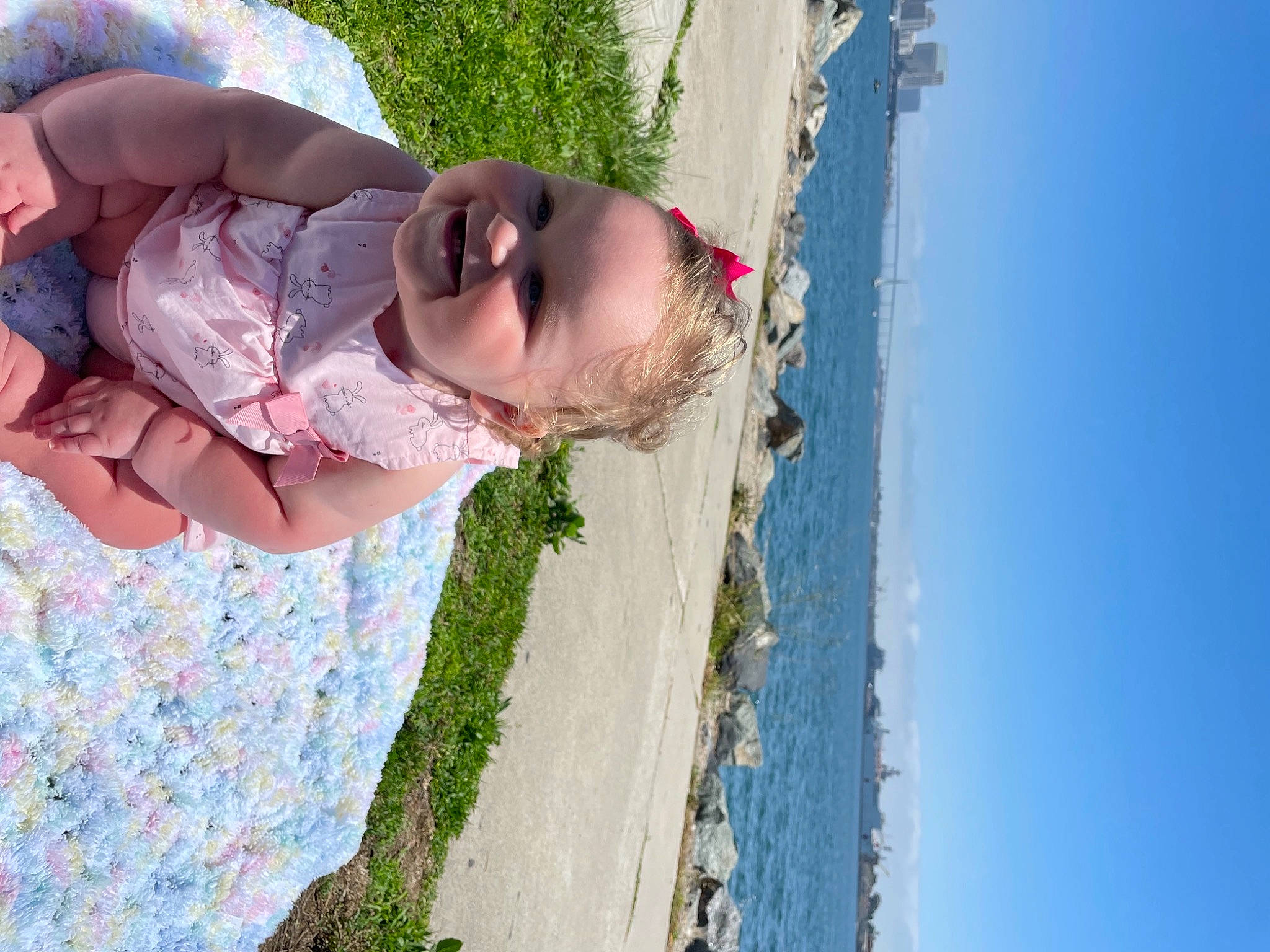 Zaylee is registered to the contest to win money with this photo: azure, baby, beach, child, dress, fun, grass, happy, hat, joy, landscape, leisure, people_in_nature, person, plant, sand, skin, sky, toddler, travel