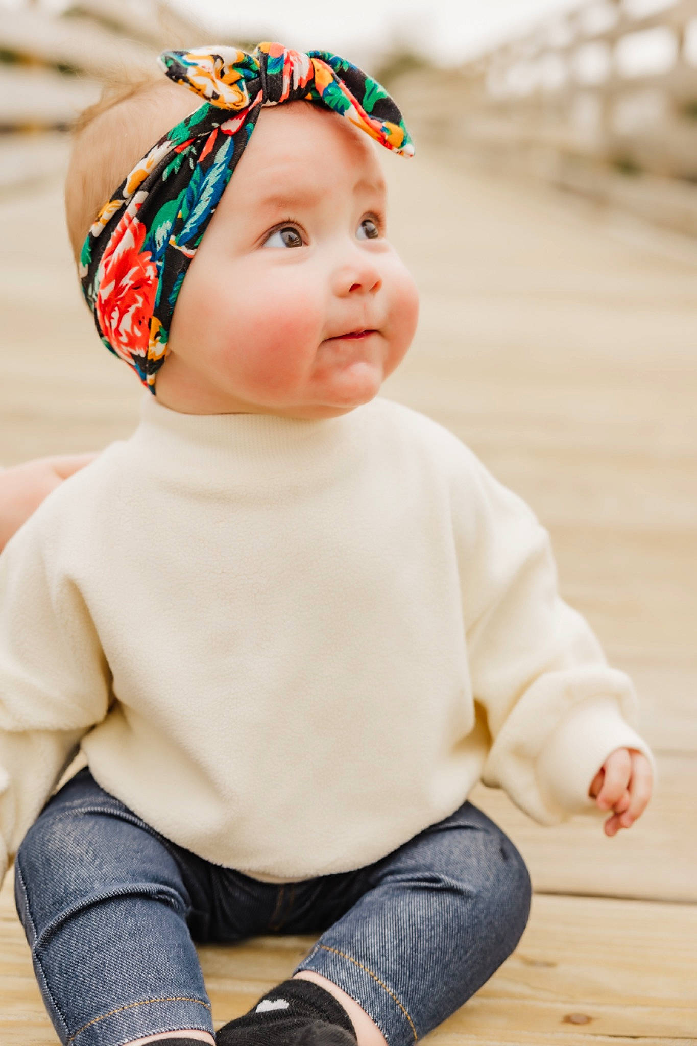 Hazel is registered to the contest to win money with this photo: baby, baby_toddler_clothing, cap, cheek, child, dress, eye, fashion_accessory, grass, happy, headband, headgear, headwear, lip, person, sitting, skin, sleeve, t_shirt, toddler