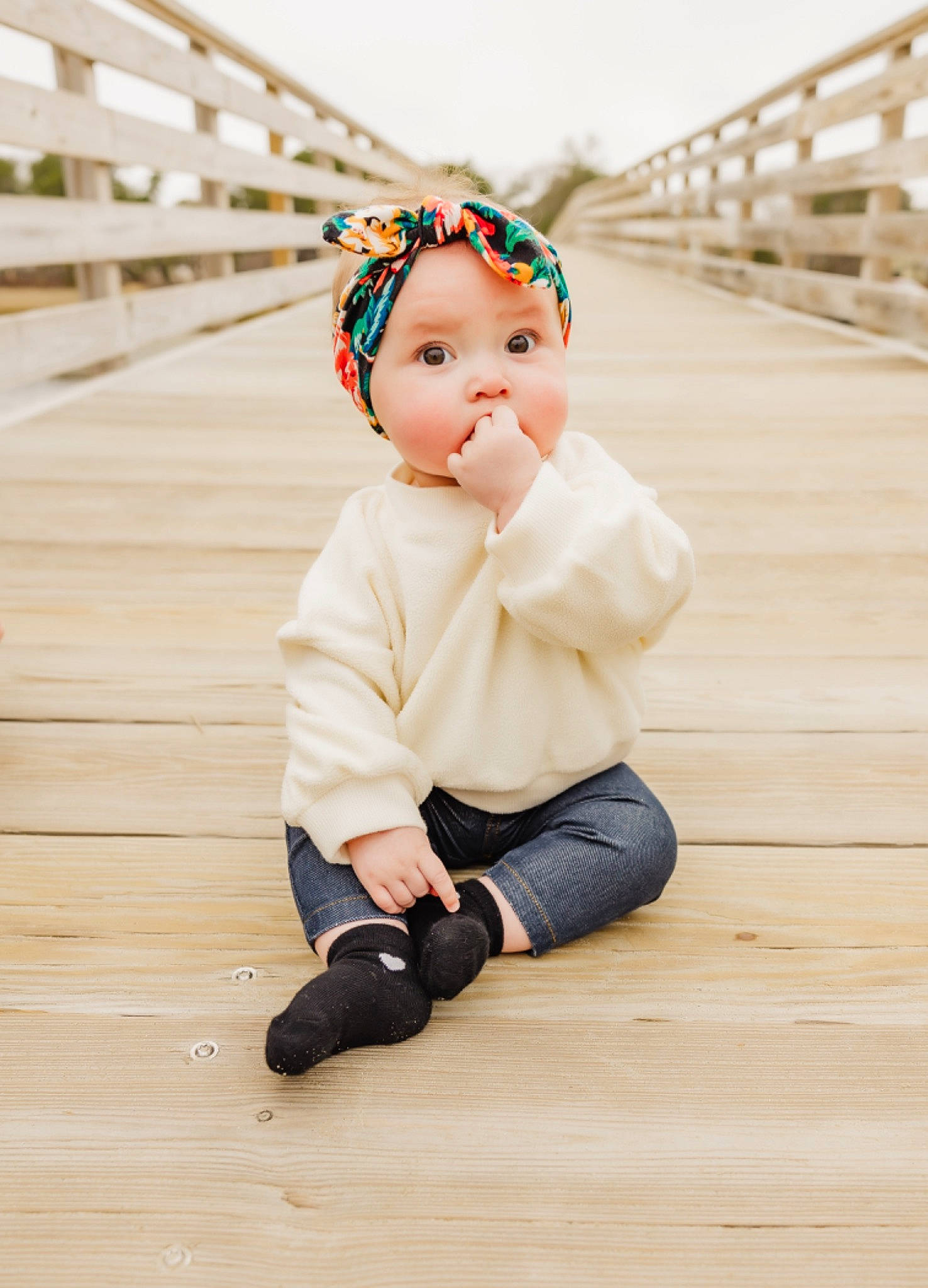 Hazel is registered to the contest to win money with this photo: baby, baby_toddler_clothing, child, fashion_accessory, flash_photography, floor, flooring, fur, happy, hardwood, headwear, laminate_flooring, pattern, person, portrait_photography, sitting, sleeve, toddler, toy, wood