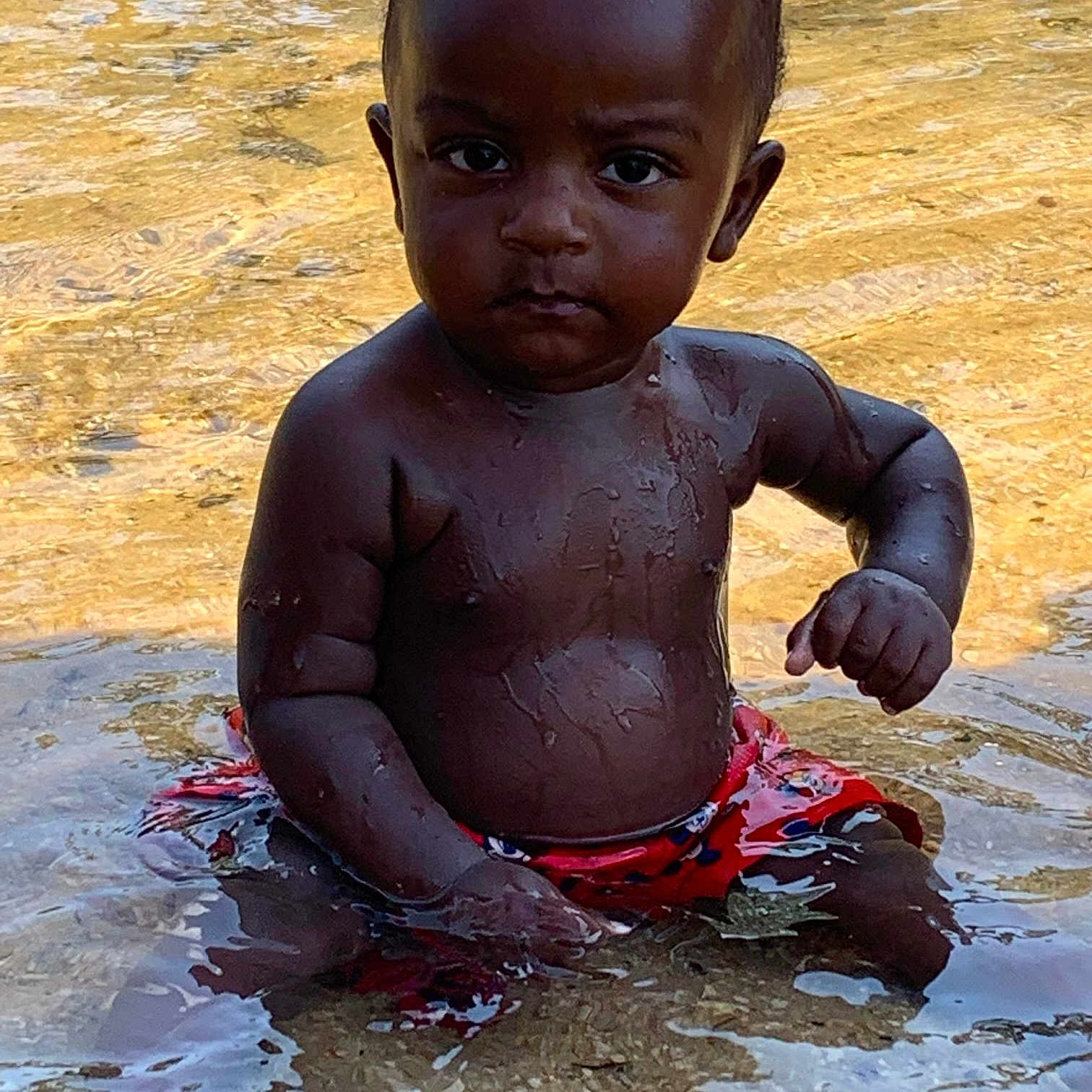 Keaton joined the competition — help win amazing prizes! baby, barechested, bathing, cheek, chest, child, eye, facial_expression, fun, happy, human_body, leisure, nose, people_in_nature, people_on_beach, play, sitting, smile, toddler, water
