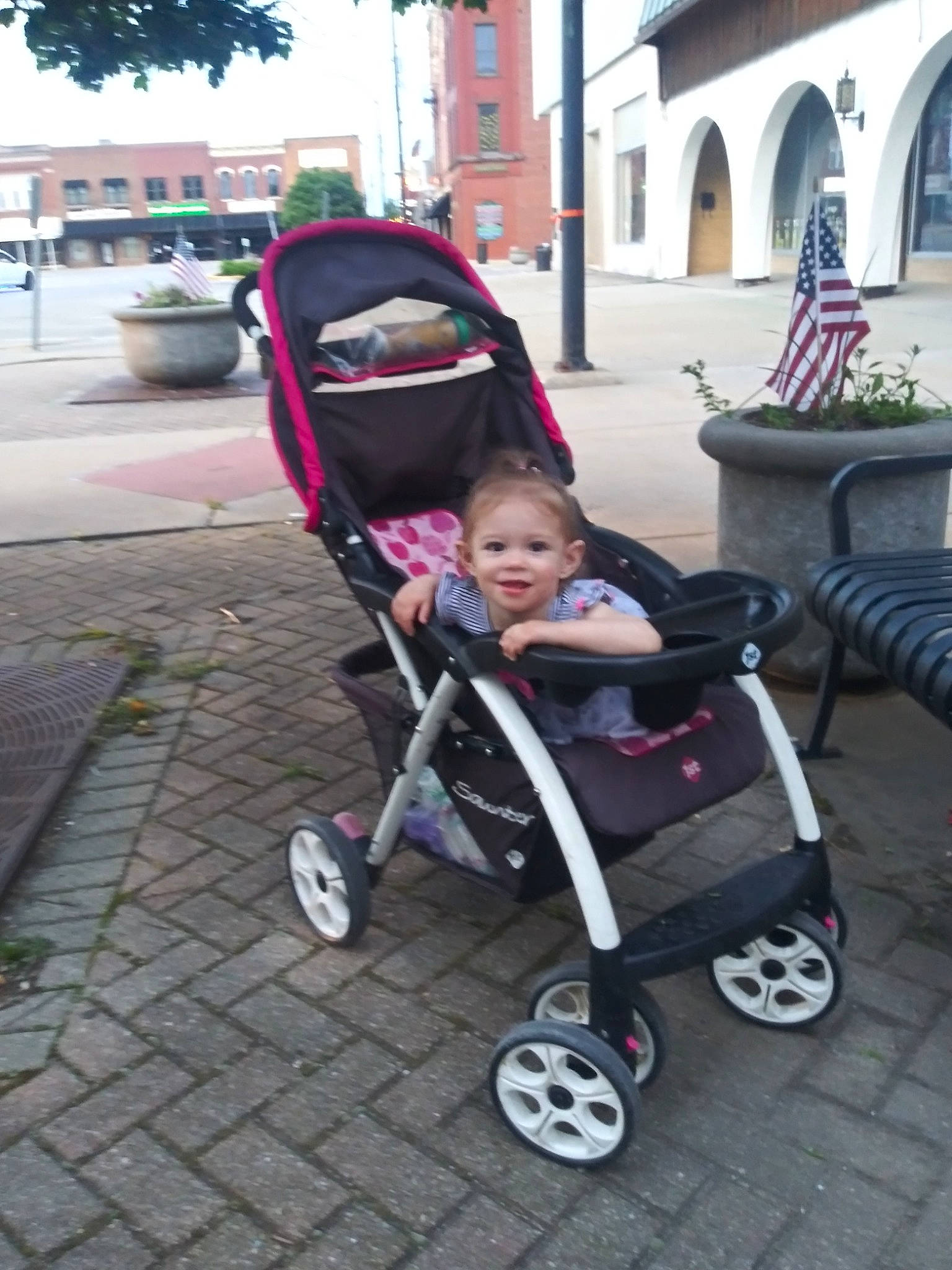 Renesmee is registered to the contest to win money with this photo: baby_carriage, baby_products, child, joy, magenta, person, product, vehicle