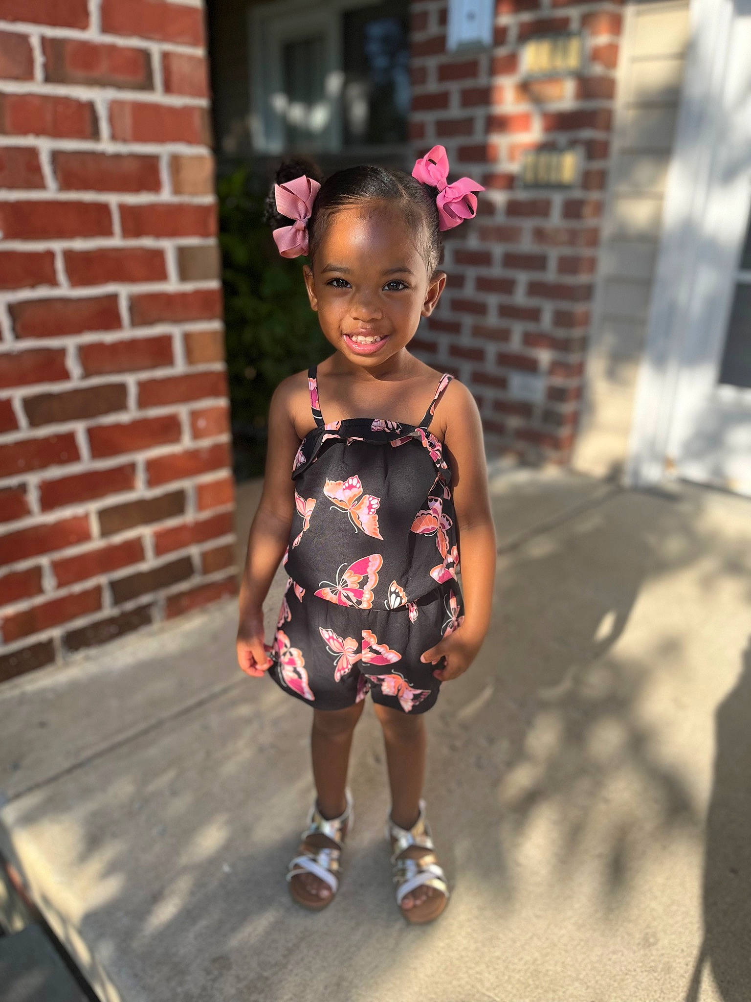 Ivy joined the competition — help win amazing prizes! asphalt, baby_toddler_clothing, brick, child, dress, event, eyewear, fashion_accessory, fun, happy, jewellery, joy, magenta, pattern, person, pink, recreation, sandal, smile, street