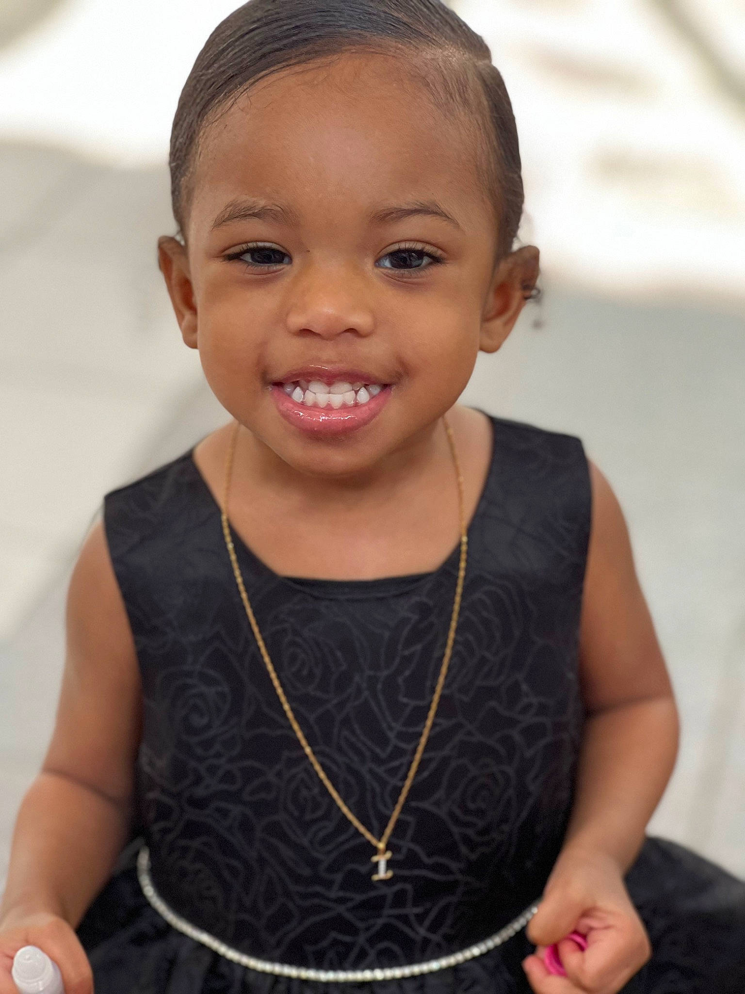 Ivy is registered to the contest to win money with this photo: child, cool, event, eyelash, flash_photography, fun, hairstyle, happy, iris, jewellery, joy, neck, necklace, person, skin, sleeveless_shirt, smile, summer, t_shirt, toddler