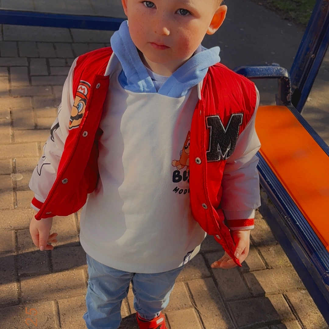 Lucas joined the competition — help win amazing prizes! adult, boy, child, clothing, coat, face, footwear, head, jacket, jeans, knitwear, male, man, pants, path, person, playarea, shoe, sweater, walkway