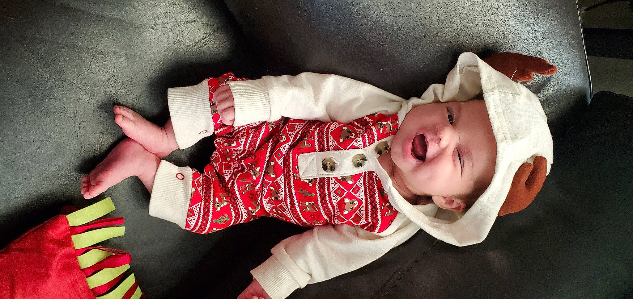 Katalina is registered to the contest to win money with this photo: baby, baby_toddler_clothing, cheek, child, costume, headwear, laugh, lip, person, sock, toddler, wrist