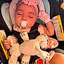Aislynn joined the competition — help win amazing prizes! baby, sleeping, pacifier, headband, flower, car_seat, plush_toy, pink_clothing, mittens, child, infant, resting, straps, safety, cute, adorable, soft_toy, peaceful, young, portrait