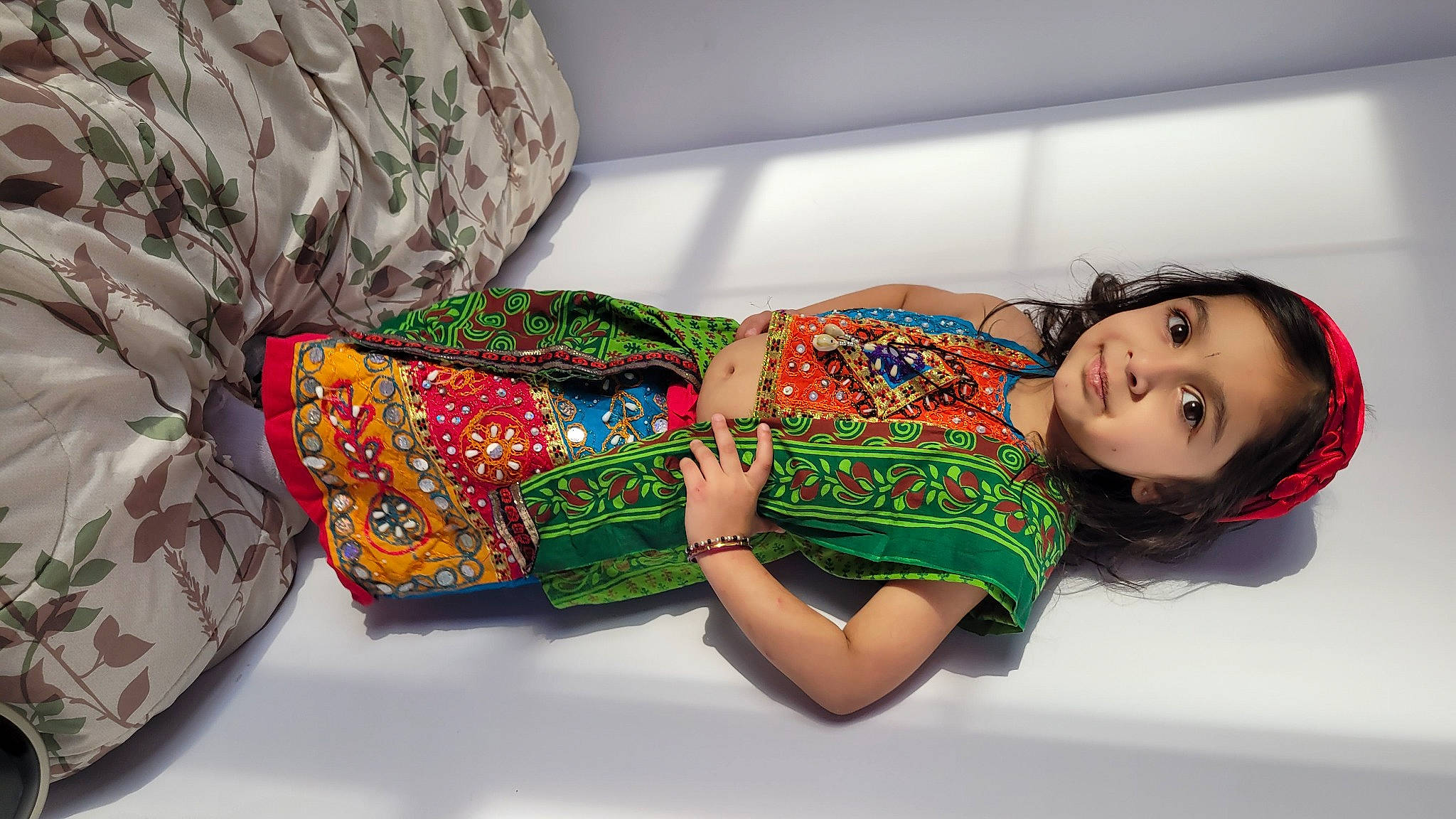 Aryaa is registered to the contest to win money with this photo: abdomen, comfort, couch, elbow, fashion_accessory, fashion_design, foot, human_leg, knee, leg, nail, pattern, person, sitting, sleeve, textile, thigh, trunk, visual_arts, waist