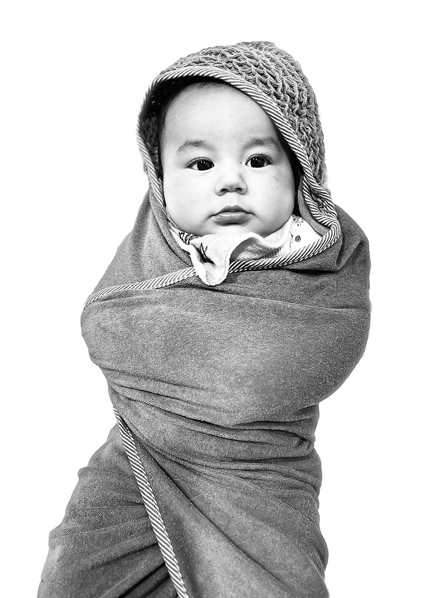 Daniel joined the competition — help win amazing prizes! baby, baby_toddler_clothing, cap, cheek, eye, face, gesture, grey, hand, happy, head, headgear, human_body, pattern, person, sleeve, smile, toddler, white, wool