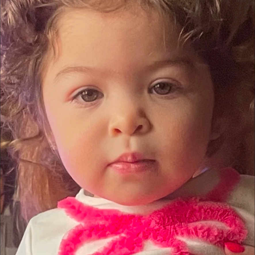 Alicia joined the competition — help win amazing prizes! accessories, baby, bodypart, bonnet, clothing, costume, dress, face, finger, flower, hand, happy, hat, head, jewelry, person, photography, plant, portrait, toy