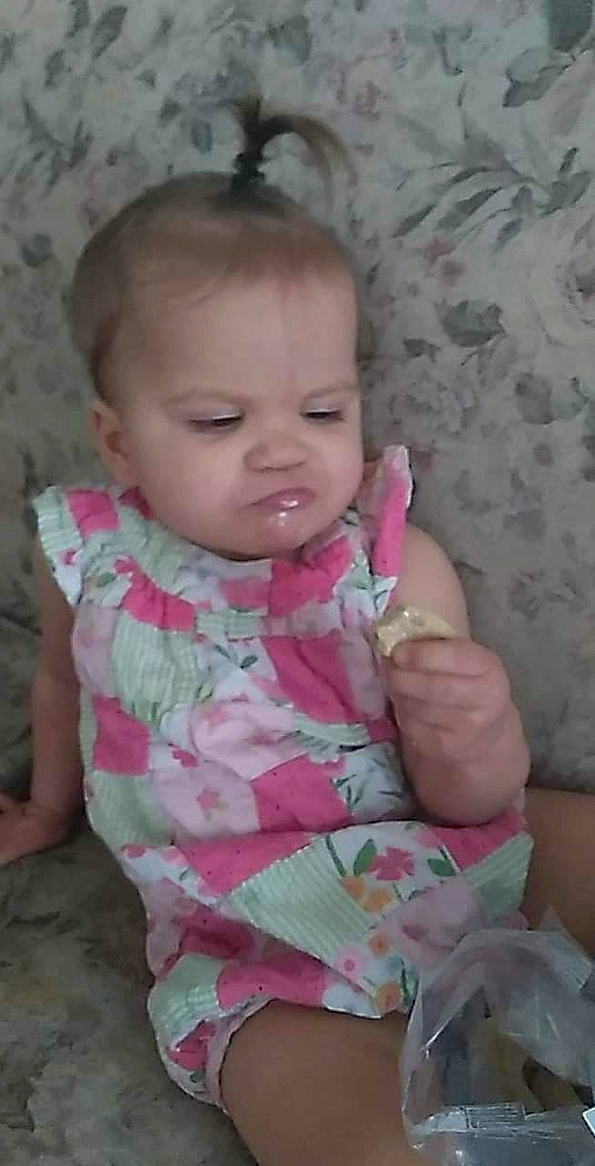 Thalia is registered to the contest to win money with this photo: arm, baby, baby_toddler_clothing, cheek, chin, eye, eyebrow, face, finger, gesture, hair, hand, iris, lip, mouth, nose, person, pink, skin, sleeve